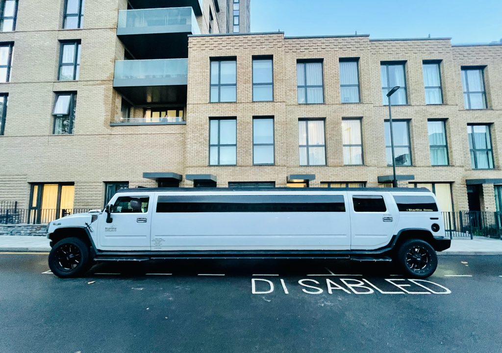 white hummer limousine on road